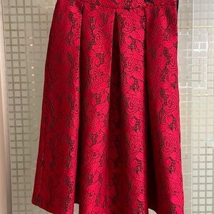 Red lack skirt from NYCO.  Size 4